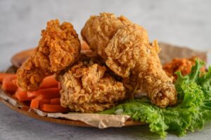 crispy-fried-chicken-plate-with-salad-carrot_1150-20212